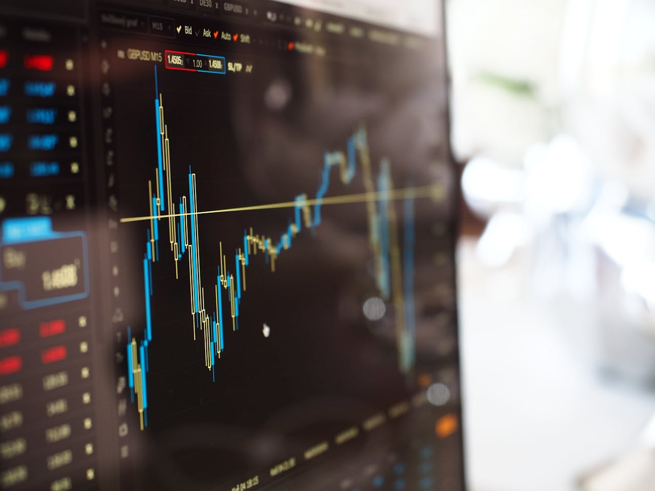 Mastering the First Impression: Your intriguing post title goes here Detailed view of financial trading graphs on a monitor, illustrating stock market trends.